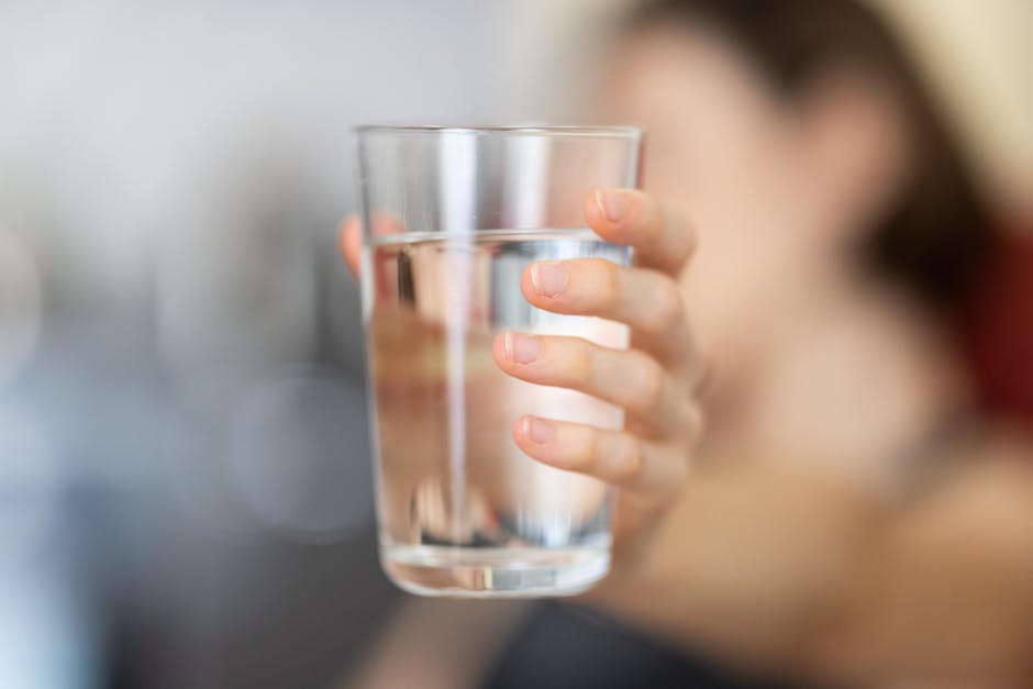 How much water should a person drink daily?